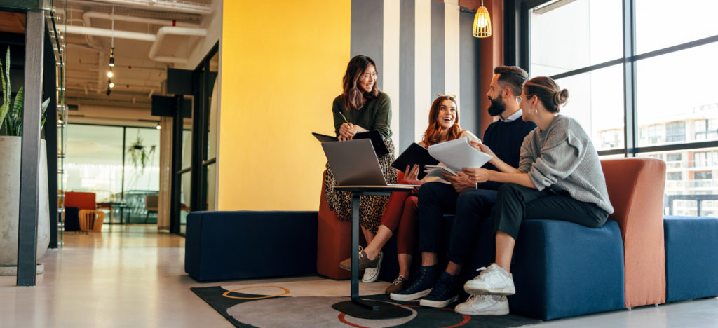 businesspeople working in an office lobby