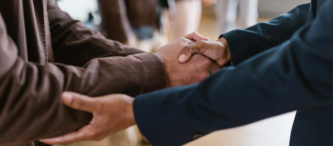 pexels-rodnae-productions-7414284 shaking hands